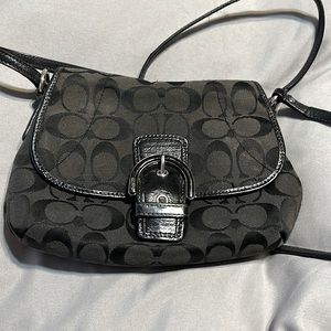 Coach hand bag. Crossbody style or over the shoulder